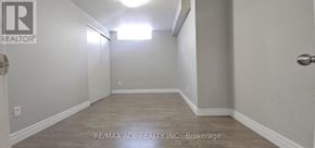 Markham (Box Grove) apartment for rent - A hallway with a brokerage sign on the wall.