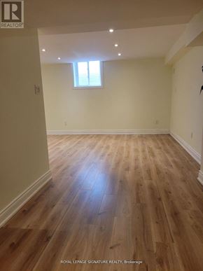 Markham (Unionville) apartment for rent - A room with wooden flooring and a window.