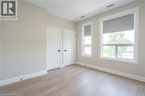 Hamilton apartment for rent - A room with a window and a door is available for rent.