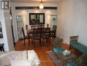 Markham (Greensborough) townhouse for rent - A dining room with a table set for six.