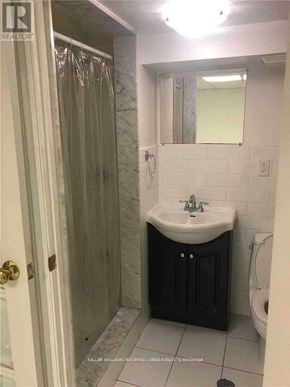 Toronto (Kensington-Chinatown) apartment for rent - A bathroom with a sink, toilet and shower.