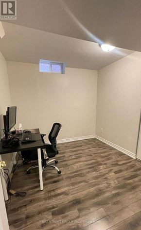 Markham (Berczy) apartment for rent - A room with a desk and a chair.