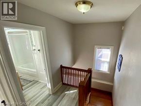 Hamilton apartment for rent - A room with a wooden floor and a window.