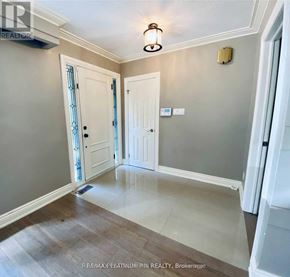 Toronto (Bayview Village) apartment for rent - A hallway with a light fixture and two doors.