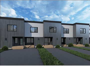 New Glasgow apartment for rent - A modern building with grey and white exterior and black roofing.