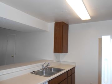 Boulder City apartment for rent - A kitchen with a sink and cabinets.