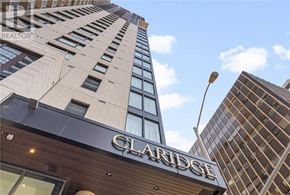 Ottawa condo for rent - The Claridge hotel sign is on a building with a modern design.