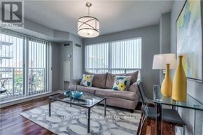 Toronto (Bayview Village) condo for rent - A living room with a glass table and a couch with a yellow pillow.