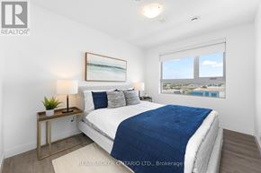 Brampton (Brampton West) house for rent - A bedroom with a bed, nightstand, and window.