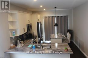 Welland (Lincoln/Crowland) apartment for rent - A kitchen with a marble countertop and a sink.