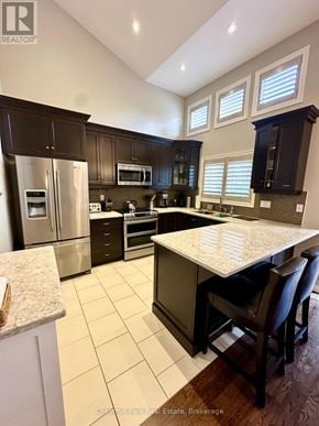 Collingwood townhouse for rent - A kitchen with a table and chairs.