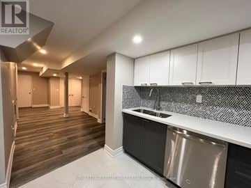 Brampton (Brampton North) apartment for rent - A kitchen with a sink and cabinets.
