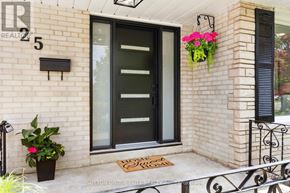 Halton Hills (Georgetown) apartment for rent - A black door with a glass panel is on a brick house.