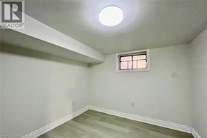 Hamilton apartment for rent - A room with a window and a light on the ceiling.