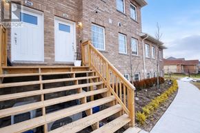 Asphodel-Norwood (Norwood) townhouse for rent - A building with the number 205 on it.