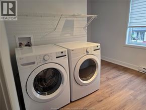 Clarence-Rockland apartment for rent - A white dryer and washer in a laundry room.