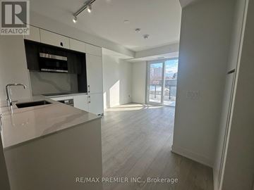 Toronto (Annex) condo for rent - A kitchen with a sink and a counter top.