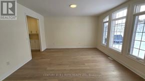 Oro-Medonte (Sugarbush) apartment for rent - A room with wooden flooring and a window on the right side.