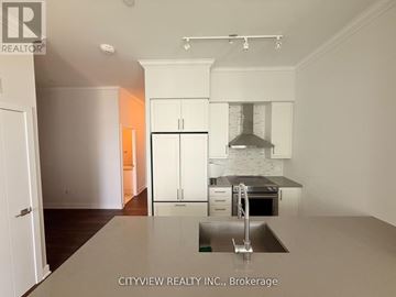 Mississauga (City Centre) condo for rent - A kitchen with a sink and cabinets.