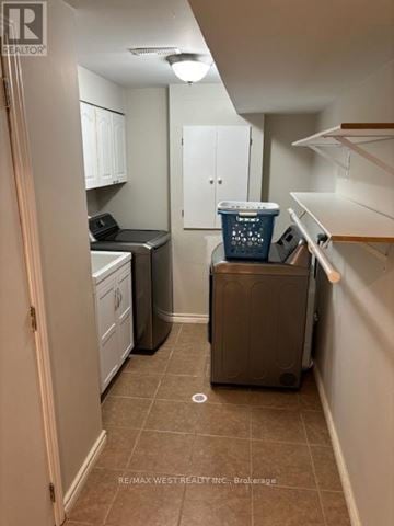 Toronto (Downsview-Roding-Cfb) townhouse for rent - A small kitchen with a dishwasher and a trash can.