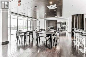 Mississauga (City Centre) condo for rent - A dining room with a long table and chairs.