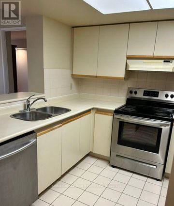 Mississauga (City Centre) condo for rent - A kitchen with a stove and sink.