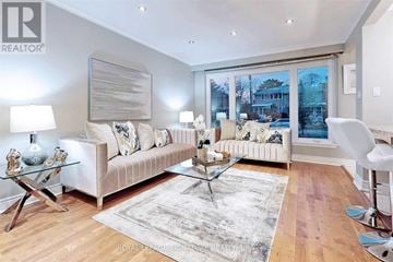 Toronto (Willowdale West) apartment for rent - A living room with a white couch and a glass coffee table.