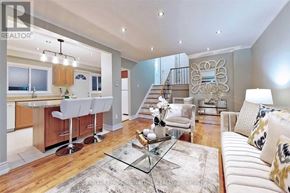 Toronto (Willowdale West) apartment for rent - A well-lit, spacious living room with a bar area and a staircase.
