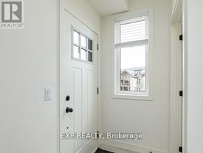 Blue Mountains condo for rent - A white door with a window above it in a room.