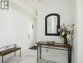 Blue Mountains condo for rent - A realtor photo of a room with a bench, mirror, and console table.