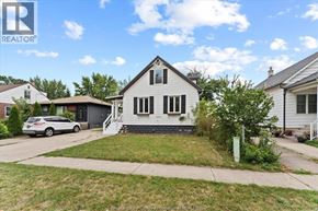 Windsor apartment for rent - A house with a car parked in front of it.