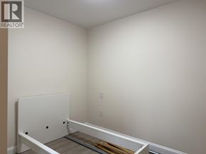 Vancouver apartment for rent - A white door is in the middle of a room.