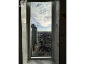New Westminster apartment for rent - A view of a cityscape from a high-rise building.