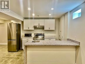 Richmond Hill (Westbrook) apartment for rent - A kitchen with granite countertops and stainless steel appliances.