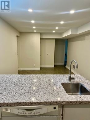 Richmond Hill (Westbrook) apartment for rent - A kitchen with granite countertops and a stainless steel sink.