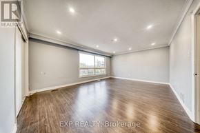 Toronto (Oakridge) apartment for rent - A room with wooden flooring and white walls, with a window on the wall.