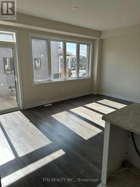 Haldimand apartment for rent - A room with a large window and sliding glass doors.