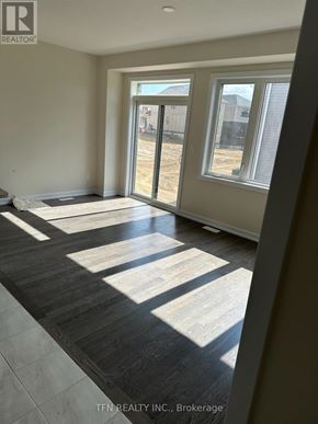 Haldimand apartment for rent - A room with a large window and a sliding glass door.