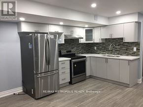 Markham (Cornell) apartment for rent - A modern kitchen with a stainless steel refrigerator and white cabinets.