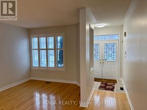 Markham (Greensborough) apartment for rent - A room with a door and a window with blinds.