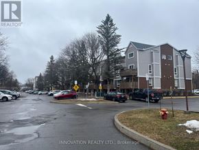 Ottawa condo for rent - A street view of a residential area with cars parked on the side of the road.