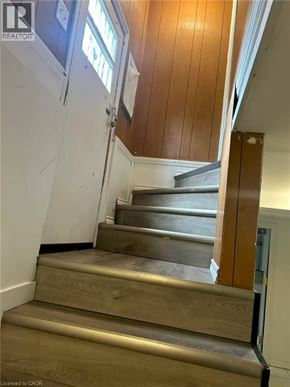 Hamilton apartment for rent - A set of stairs leading up to a door.