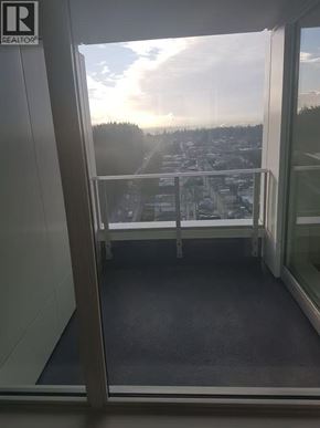 Vancouver apartment for rent - A balcony with a view of a cityscape.