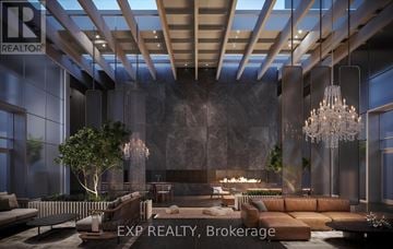 Vaughan (Vaughan Corporate Centre) condo for rent - A modern living room with a large sofa set and a chandelier.