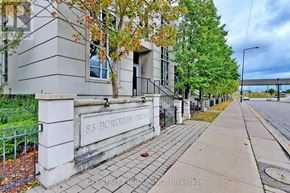 Toronto (Bendale) condo for rent - A street view of 83 Borough Drive with a sidewalk and trees.