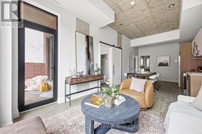 Ottawa condo for rent - A living room with a couch, a coffee table, and a window.