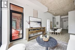 Ottawa condo for rent - A modern living room with a coffee table in the center.