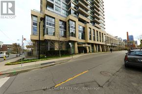Toronto (North St. James Town) condo for rent - A street view of a building with the logo REAL ONE REALTY INC., Brokerage on the bottom right.