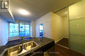Toronto (North St. James Town) condo for rent - A kitchen with a sink and a window.