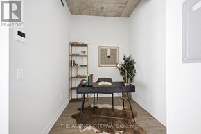 Ottawa condo for rent - A room with a table and a chair in it.